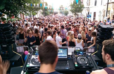 DJ with crowd at Clapham Street Party